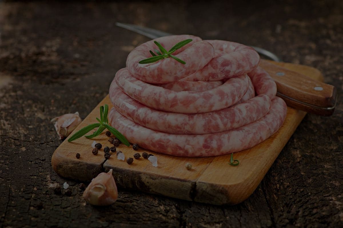 Fresh boerewors on a wooden board