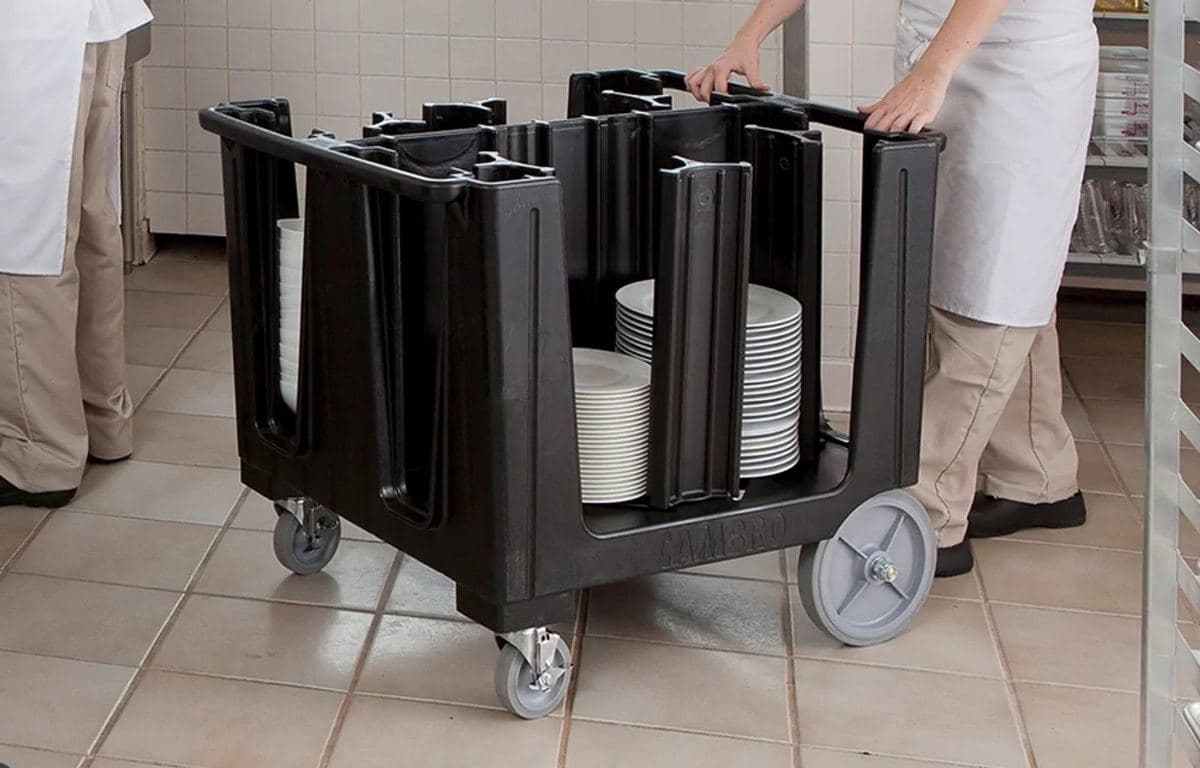 Cambro dish dolly loaded with plates in a scullery