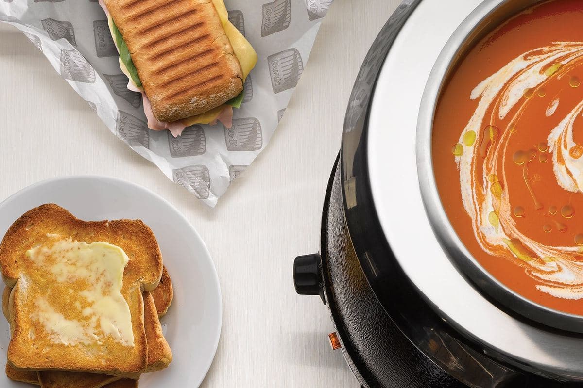 Tomato soup in a Dualit soup kettle, with toast and a toasted panini