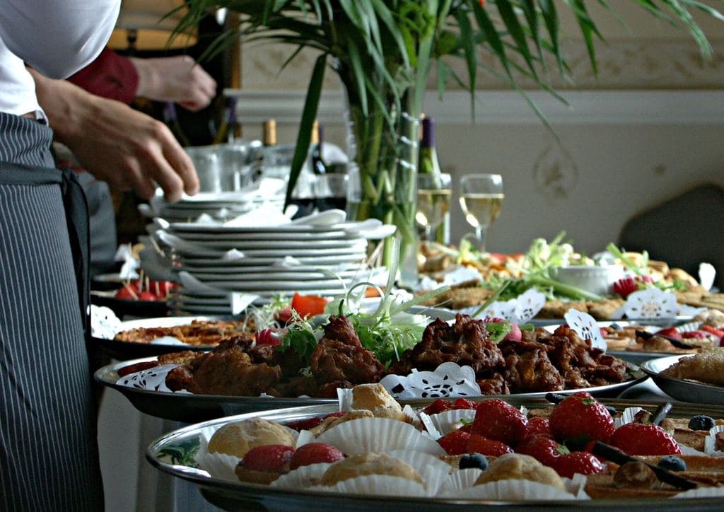 Guests helping themselves at a catered buffet
