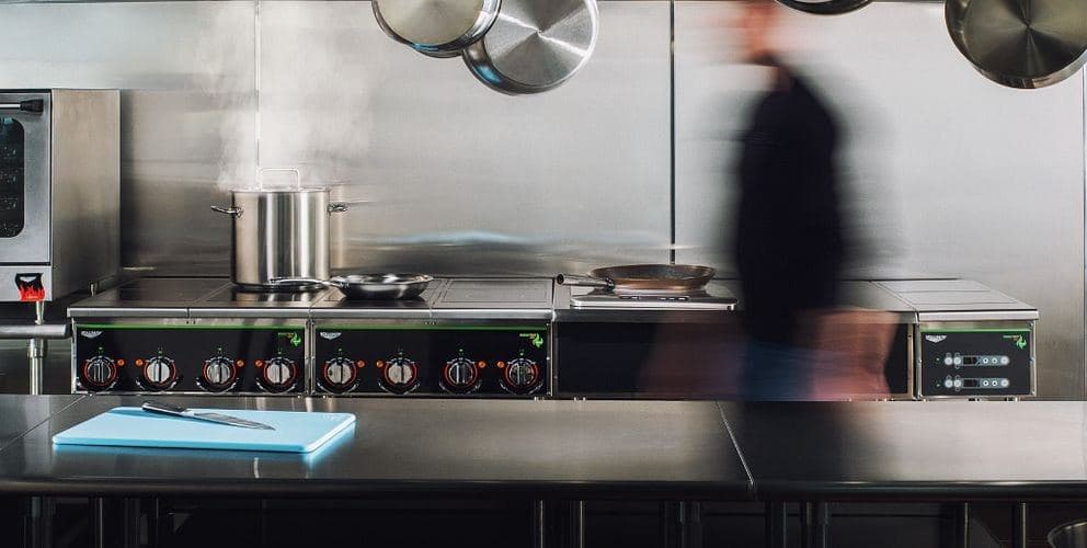 Pujadas stock pot steaming on a professional range