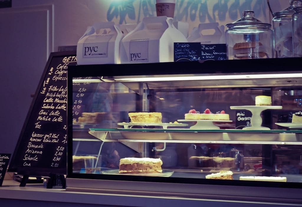 Cakes in a refrigerated display cabinet in a café