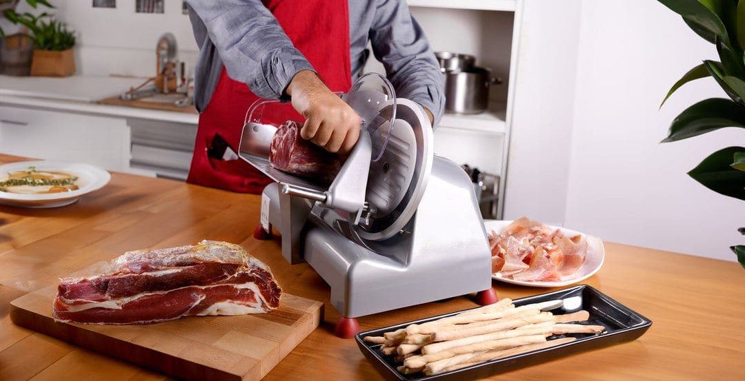 Meat sliced on a Tre Spade slicer