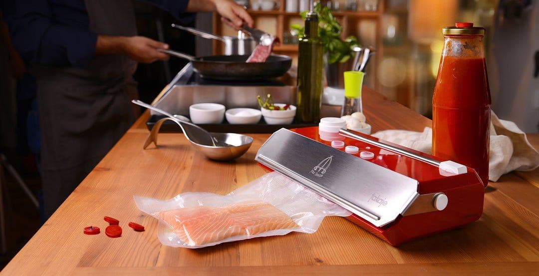 Fish vacuum-packed on a Tre Spade Takaje machine