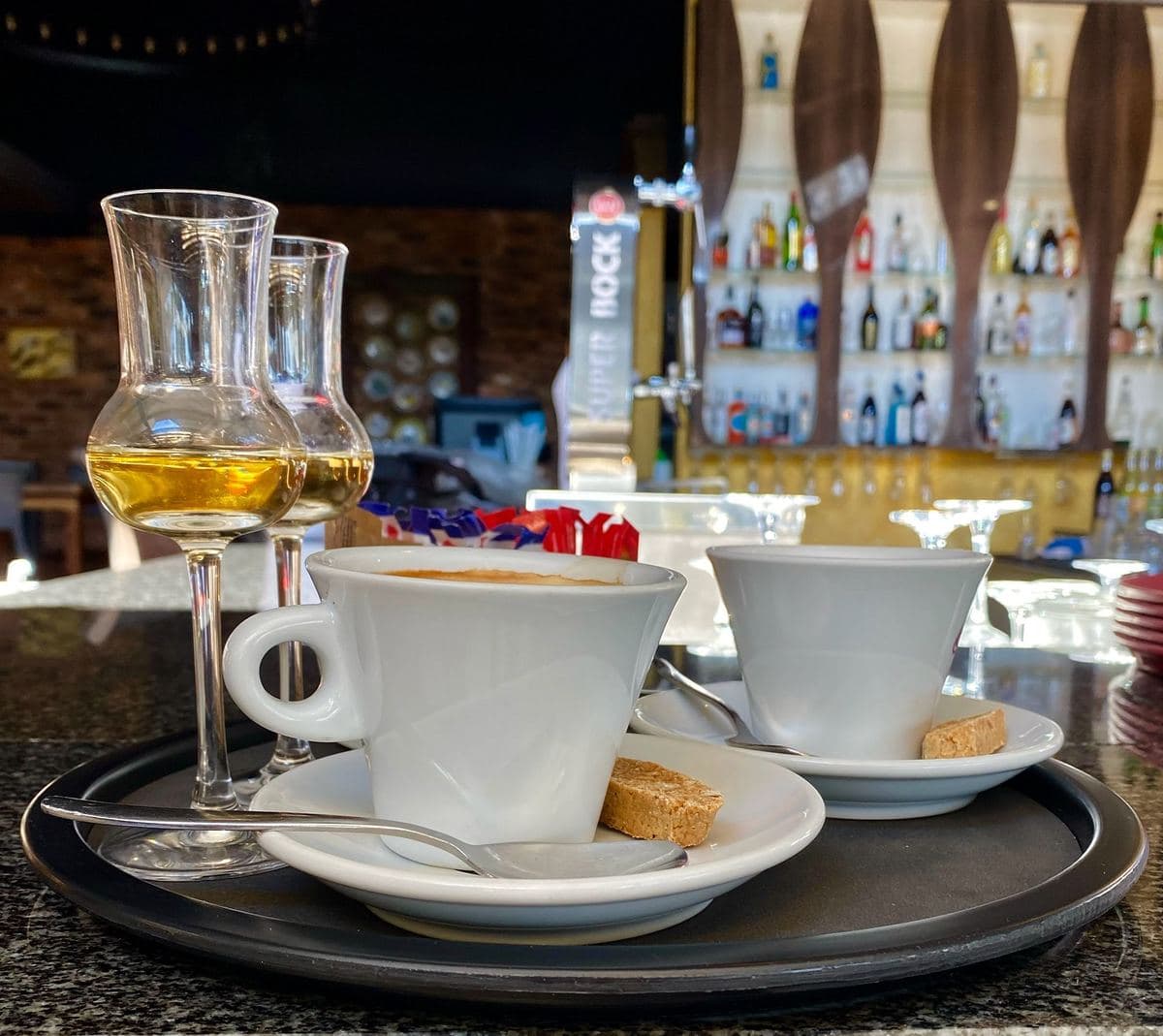 Coffee and grappa served on a Tuff Tray
